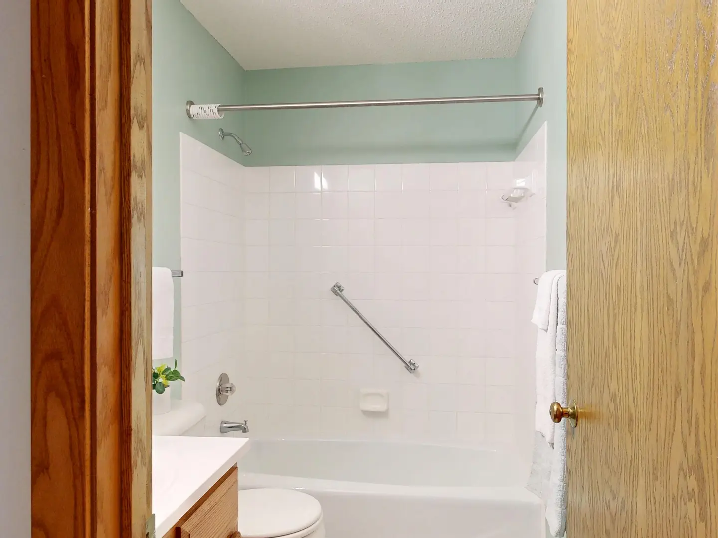 Shower Curtain Rod Height: How High Should You Hang It?