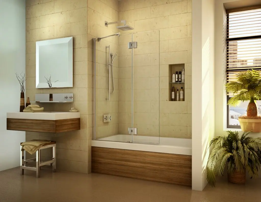 Modern bathroom featuring a glass bath screen, shower, and wooden vanity with a sink.