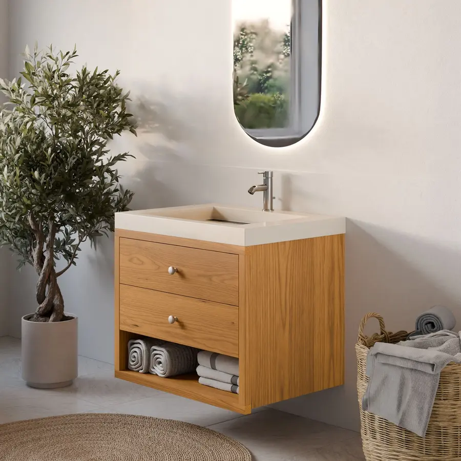 Modern wooden bathroom vanity with two drawers and a sink, featuring towels and plants.