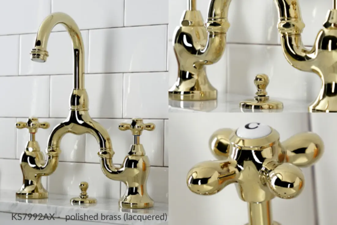 Polished brass bathroom faucet with dual handles and decorative base.