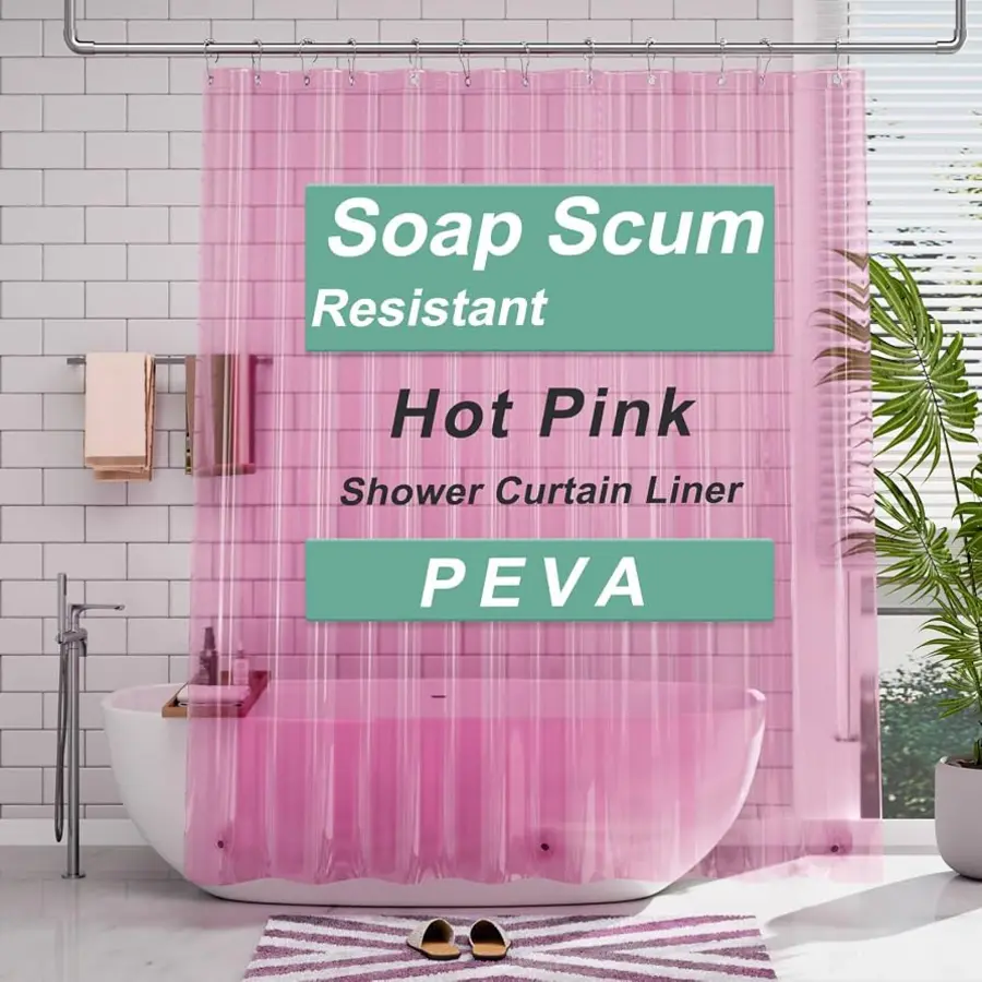 Pink shower curtain liner in a bathroom setting with a white bathtub and plants.