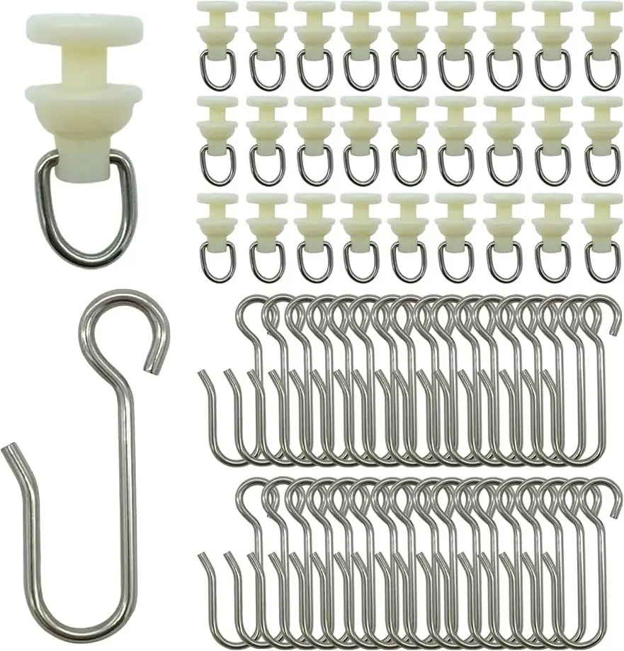 Plastic and metal curtain hooks arranged in a grid pattern.