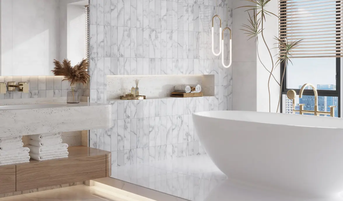Modern bathroom featuring marble walls, a freestanding tub, and stylish lighting.